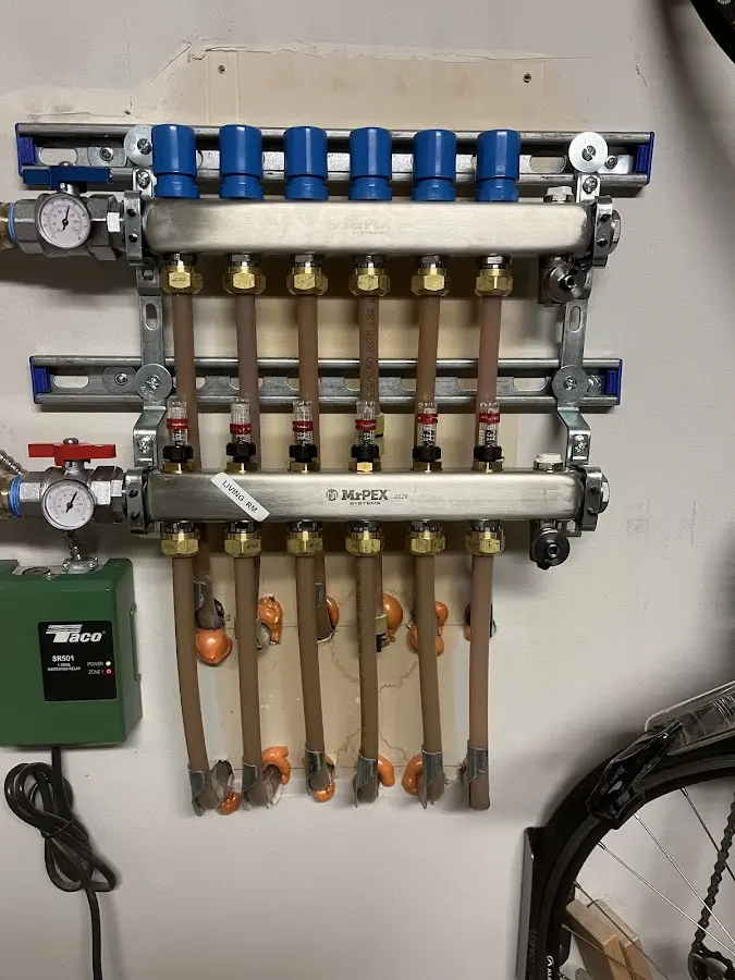 Plumber performing Gas Leak Detection at a residential property in Narragansett